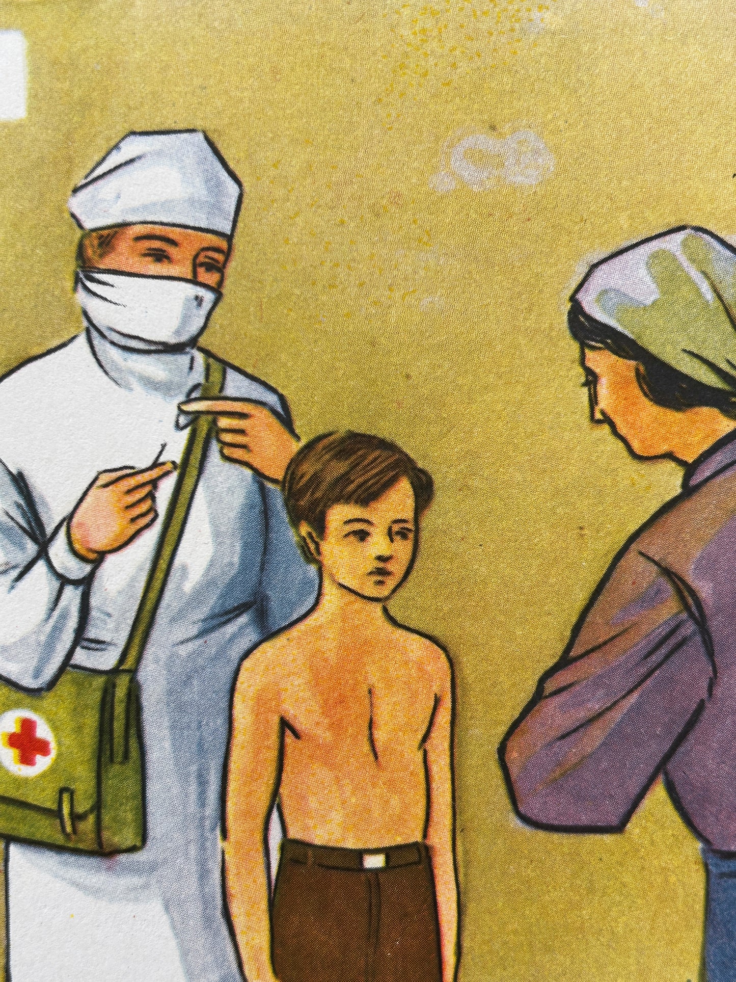 Detail of a USSR vintage medical poster showing a nurse giving an injection to a boy with his mother looking on.