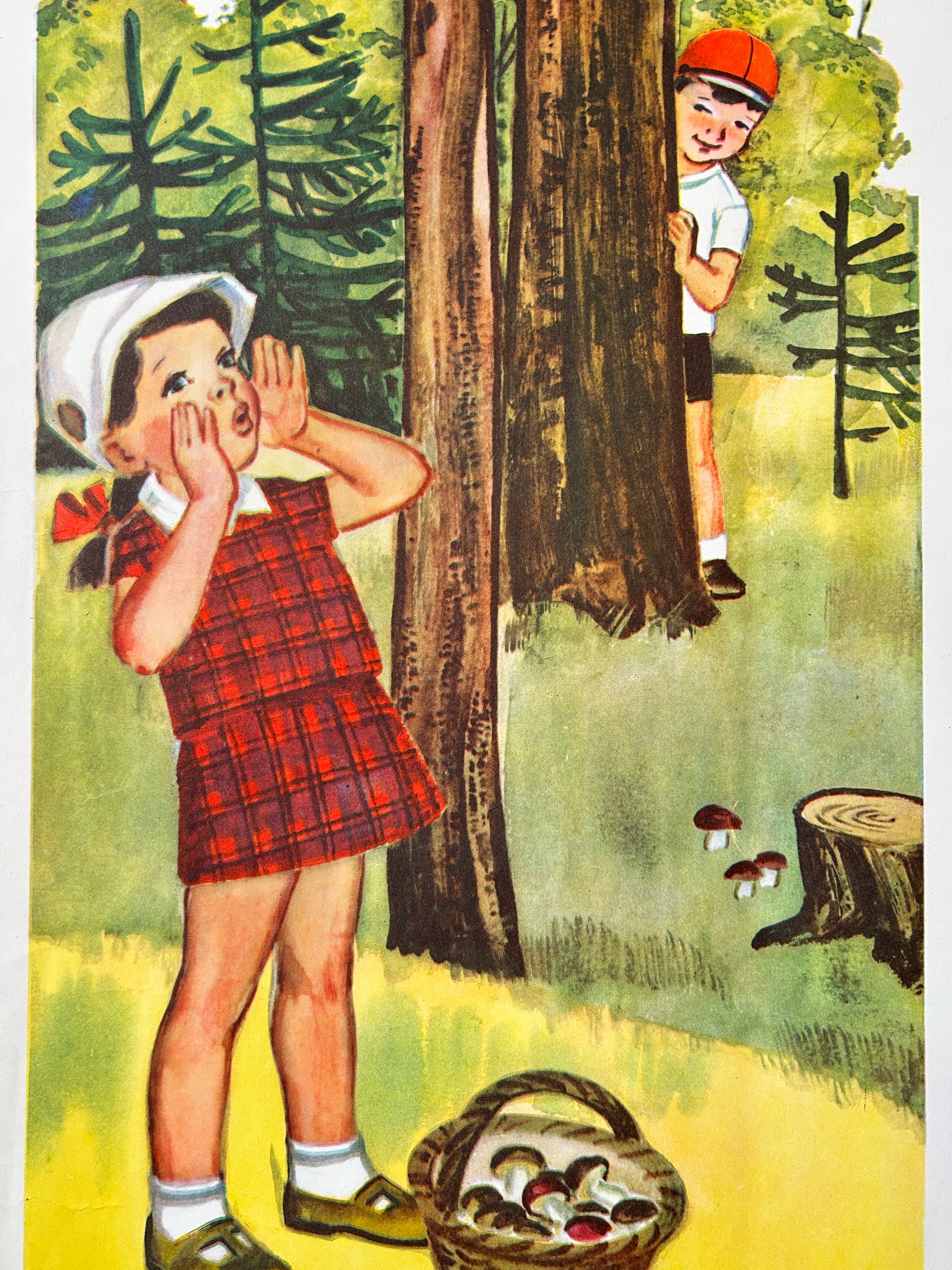 Detail of USSR vintage children's poster - and illustration showing a girl in a red plaid dress and white bonnet shouting toward a tree where a boy in a red cap is peeking out, with a basket of mushrooms in the foreground.