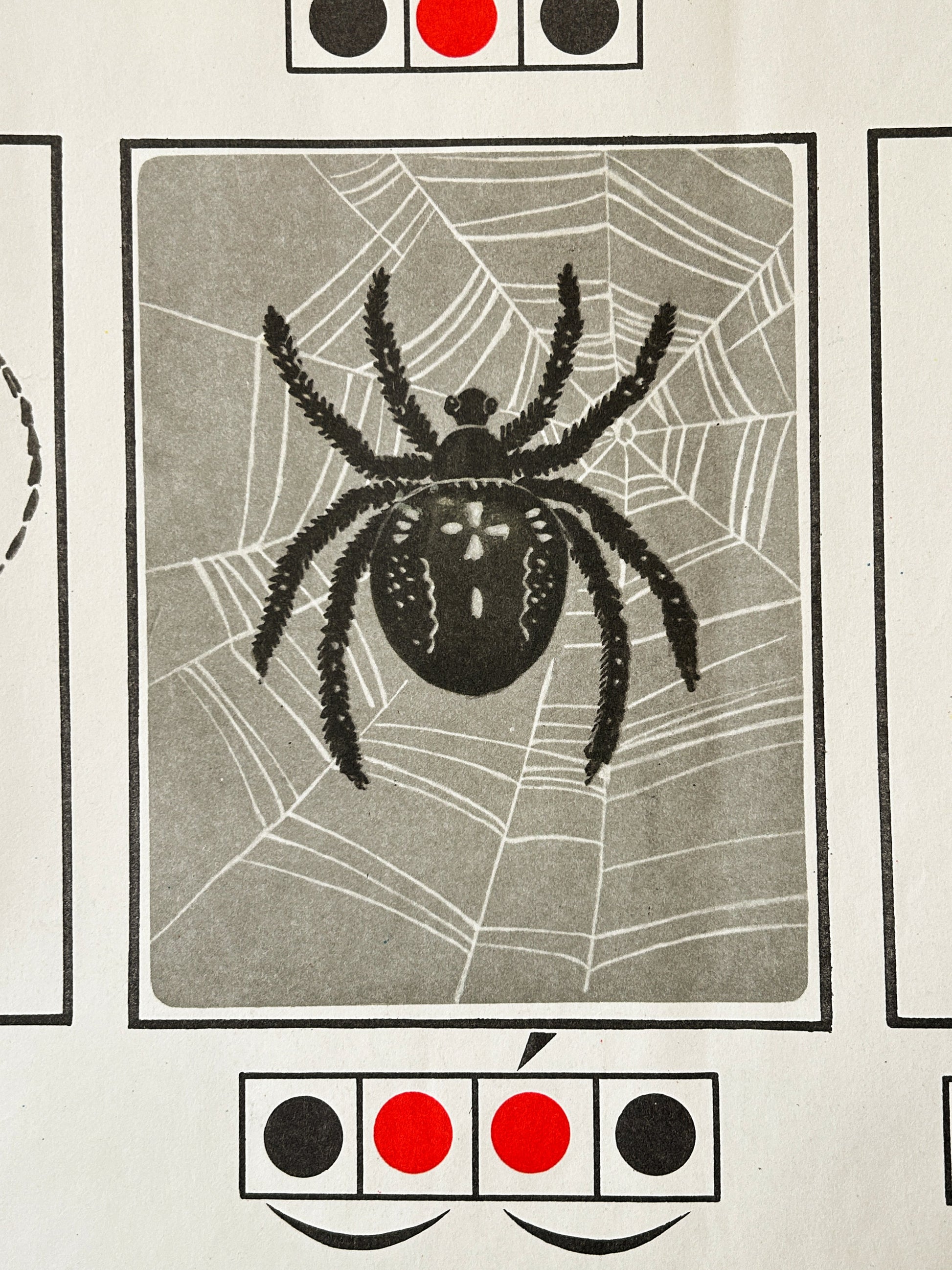 Close-up detail of a USSR vintage nursery poster with a spider illustration and phonetic diagram.
