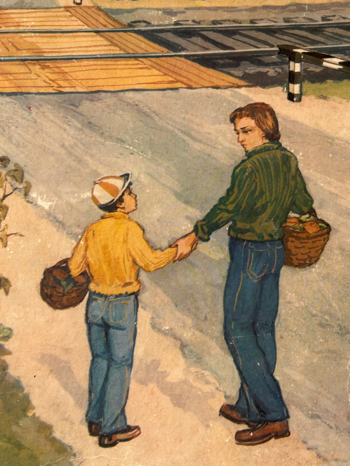 USSR vintage road safety poster detail: illustration of a man and a boy holding hands on a path, approaching the railway crossing.